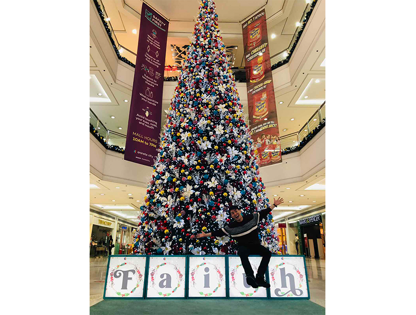 Araneta City lightens up giant mall Christmas trees with positive messages
